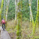 Riding a boardwalk at Galbraith Mountain