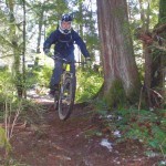 Jumping some roots on the "Mama Bear" Trail at Cumberland