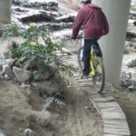 Riding a ladder at I-5 Colonnade