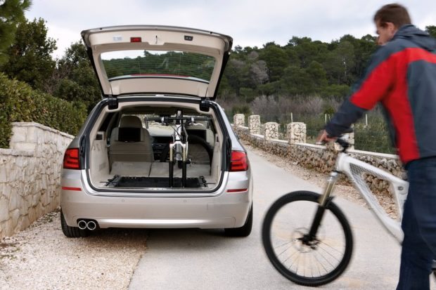The BMW 5 Series Touring takes bikes standing up